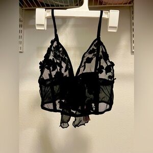 Victoria Secret bra with bow in front of